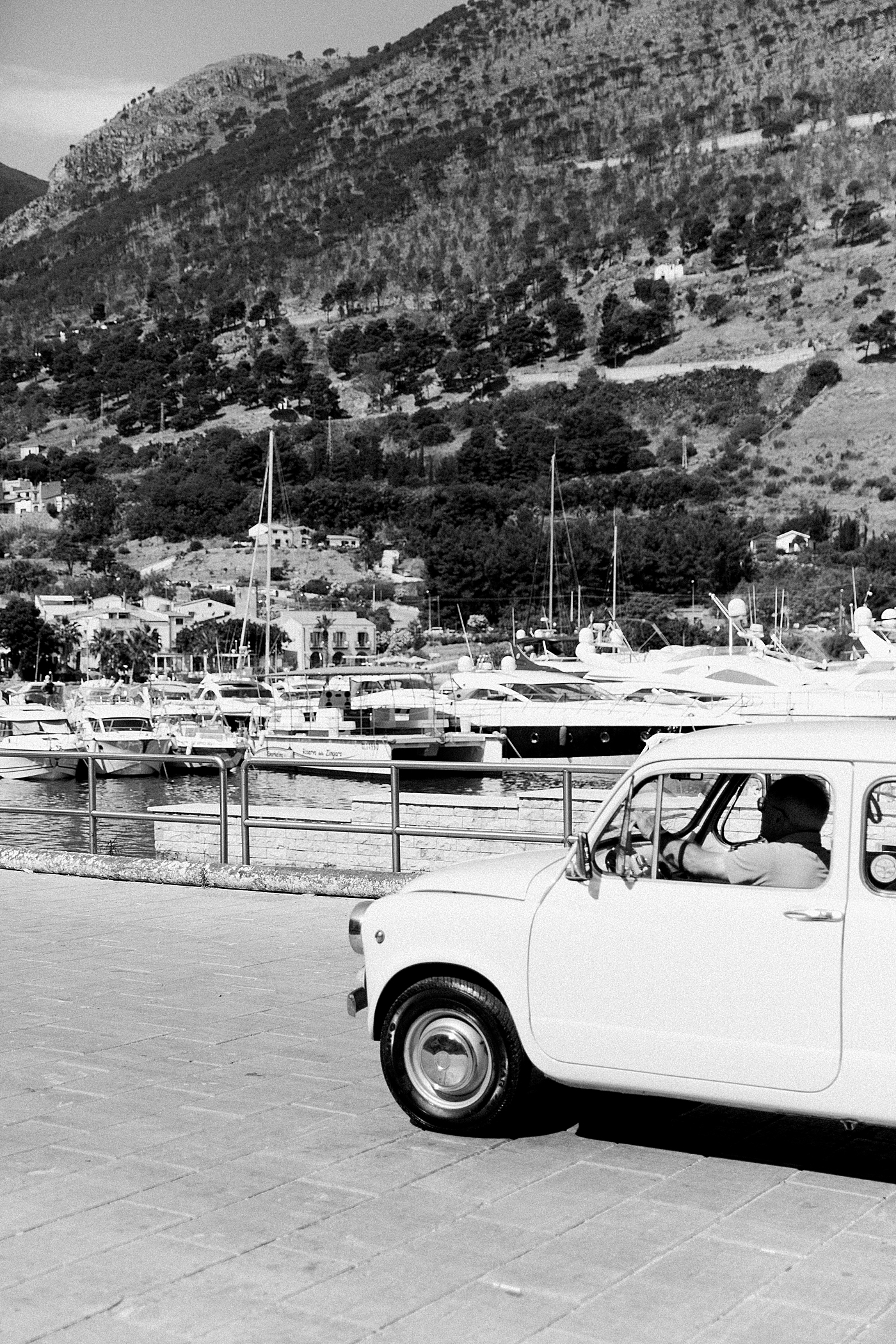 Black and white photo of a tiny italian car | Photo by Josie Derrick 